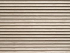 a close up view of the wooden slats on a building's exterior window