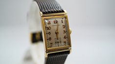 "For Sale: (1)K038 1950's Vintage Hamilton 14k Gold Watch PLEASE READ ENTIRE DESCRIPTION BEFORE PURCHASING Amazing 14k yellow gold Hamilton watch. Perfect for a graduation present or an anniversary gift. Specifics: Hamilton Approximately Automatic Case width: 19.0 mm Lug width: 18 mm Length: 6\" Weight: 24.5 grams **Please be patient & allow up to several weeks for delivery** (Despite the \"estimated delivery date\") (We've had packages reach their destination within a few days, others have Retro Yellow Gold Watches For Formal Occasions, Retro Yellow Gold Formal Watch, Antique Yellow Gold Watch Bands For Formal Occasions, Retro Gold Watch Accessories For Formal Occasions, Gold Watch Bands With Date Display For Formal Occasions, Vintage Yellow Gold Watch Accessories For Business, Retro Yellow Gold Watch With Chronometer, Vintage Gold Watch Bands For Formal Occasions, Retro Yellow Gold Chronometer Watch