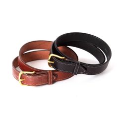 These beautiful 100% leather belts are handmade by an Amish family in Pennsylvania. Fine stitching and brass buckle make them dressy enough to wear with a business suit but versatile enough to wear with your favorite pair of jeans. They'll take you from the board room to the weekend with ease.  Genuine English bridle leather Available in black or brown Even sizes from 32"-50" 1-1/4" wide Buckle about 1-3/4"L x 1-3/4"W USA made  BELT SIZES: Order one size larger than your pants size. These belts Classic Fitted Belts And Suspenders With Belt Included, Classic Black Belts And Suspenders With Brass Buckle, Classic Black Belt With Brass Buckle, Classic Belt Buckles For Workwear, Classic Adjustable Belt Buckles For Workwear, Classic Belts With Brass Buckle For Everyday Use, Classic Everyday Belts With Brass Buckle, Classic Formal Belt With Brass Buckle, Classic Adjustable Belt With Brass Buckle