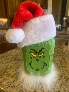 Crown large bottle painted as Grinch Grinch Bottle Crafts, Crown Royal Bottle Crafts Diy Halloween, Christmas Liquor Bottle Crafts, Decorated Crown Royal Bottles, Grinch Wine Bottle Diy, Liquor Bottle Crafts Diy Ideas, Whisky Bottle Crafts