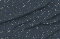 a dark blue background with gold stars and crescents in the center, as well as a