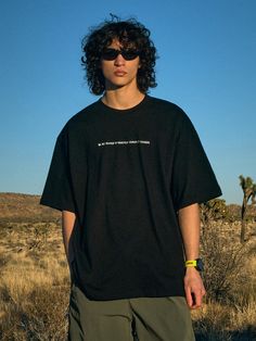 This comfortable oversized T-shirt simply accented with lettering embroidery. It's made from bio-washed high-density durable premium cotton jersey.- Ribbed crew neck- Letterning embroidery at front and back- Drop shoulder- Short sleeves- Oversized fit- Unisex wear- Minimized shrinkage and distortion Short Sleeve T-shirt With Letter Embroidery For Streetwear, Oversized Black T-shirt With Embroidered Graphics, Black Cotton T-shirt With Letter Embroidery, Trendy Short Sleeve T-shirt With Letter Embroidery, Urban Crew Neck T-shirt With Relaxed Fit, Streetwear Short Sleeve Tops With Letter Embroidery, Streetwear T-shirt With Letter Embroidery And Crew Neck, Urban Style Relaxed Fit Crew T-shirt, Trendy Crew Neck T-shirt With Letter Embroidery