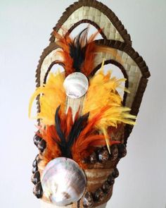 a headdress made out of shells and feathers