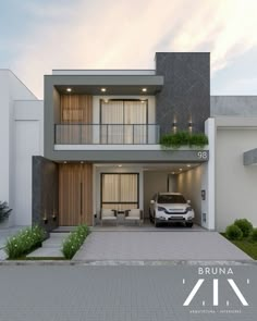 a car is parked in front of a modern house