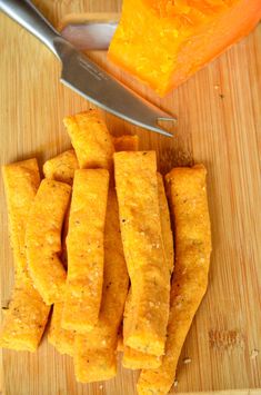 some cut up food on a cutting board with a knife