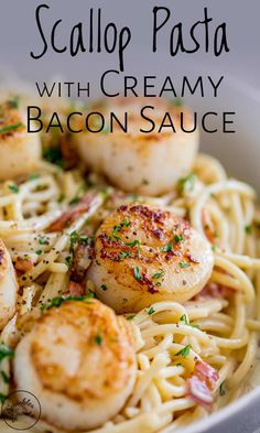 scallop pasta with creamy bacon sauce in a white bowl