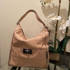 Beautiful Blush Pink Leather Bag. Never Used! Beige Shoulder Bag With Silver-tone Hardware For Errands, Beige Hobo Bag With Silver-tone Hardware For Everyday Use, Beige Satchel Hobo Bag With Silver-tone Hardware, Beige Hobo Bag With Silver-tone Hardware, Beige Tote Hobo Bag With Silver-tone Hardware, Pink Leather, Michael Kors Bag, Blush Pink, Leather Bag