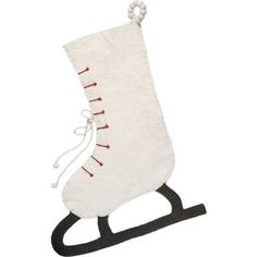 a white christmas stocking sitting on top of a wooden sled with black handles