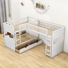 a white bunk bed with drawers underneath it