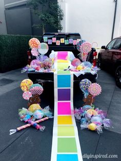 a truck with balloons and streamers on the back