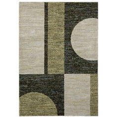 an area rug with various shapes and colors on it, including black, beige, green,