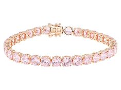 Bella Luce® pink diamond simulant 37.47ctw round, Eterno™ 18k rose gold over sterling silver tennis bracelet. Measures approximately 7.25" - 8" L x 0.25" W and has a hidden box clasp closure. Diamond equivalent weight is 22.70ctw. Pink And Gold Bracelets, Pink Jewelry Bracelets, Gold Pink Jewellery, Gold And Pink Bracelet, Pink And Gold Bracelet, Pink Prom Jewelry, Pink Prom Accessories, Pink Diamond Tennis Bracelet, Gold And Pink Jewelry