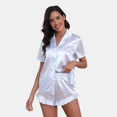 The Satin Blue Stripe Button Front Down Shirt & Shorts Pajama Sets offer a perfect blend of luxury, comfort, and style for a restful night's sleep or relaxing at home. The satin fabric provides a smooth and indulgent feel, while the classic blue striped pattern adds a touch of sophistication. The button-front shirt and coordinated shorts create a polished and stylish appearance, making these pajama sets a luxurious addition to any sleepwear collection. Product code: CAA10A4D001CC Bedtime Relaxation, Pyjamas Shorts, Satin Pyjamas, Pyjamas Set, Cute Pjs, Striped Pyjamas, Satin Pyjama Set, Satin Color, Satin Pajamas