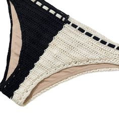 Zimmermann Clover Crochet Bikini Set in Black & WhiteSize 1 / SColor Black and creamPreloved **Some light yellowish spots at the bikini bottoms. Unsure if they are removable. Website DetailsSelf: 100% cottonLining: 92% polyamide, 8% elastaneTies: 80% polyamide, 20% elastane. Made in China. Hand wash. Unpadded. Halterneck and back tie closures. Side tie hip closures. Lightweight crochet fabric. Sold as a set. Our Style No. ZMER-WX139. Manufacturer Style No. 4980WCLO.1141-YMost items are previousl Beige Beachwear Bottoms For Pool, Cream Stretch Bottoms For Beach, Stretch Cream Bottoms For Beach, Cream Stretch Bottoms For The Beach, Stretch Cream Bottoms For The Beach, Cream Triangle Top Swimwear For Beach, Cream Swimwear For Beachwear, Cream Beachwear Swimwear For Pool, Cream Swimwear For Pool