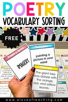 a hand holding two cards with the words poetry and free printables