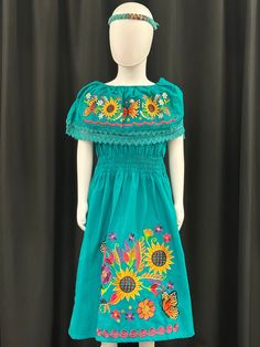 Gorgeous embroidered dress for a special ocassion. The sleeves can be worn up or down. It also has elastic on the waist for a comfortable fit. Green Dresses With Embroidered Sleeves For Spring, Green Dress With Embroidered Sleeves For Spring, Green Spring Dress With Embroidered Sleeves, Casual Dress With Multicolor Embroidered Hem, Casual Dress With Multicolor Embroidery And Embroidered Hem, Casual Green Dress With Floral Embroidery, Casual Summer Dress With Embroidered Sleeves, Traditional Summer Dress With Embroidered Sleeves, Summer Embroidered Dress With Multicolor Sleeves