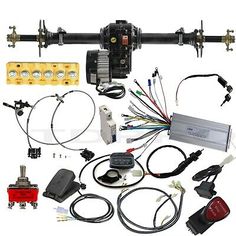 an assortment of parts and wires for a vehicle