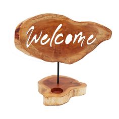 a wooden sign that says welcome on it