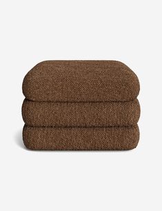 two brown towels stacked on top of each other