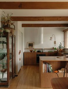 the kitchen is clean and ready to be used as a dining room or living room