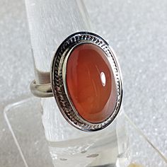 Genuine 925 Sterling Silver Ring Gemstone - Carnelian Colour - Orange Stone Size - 18x11 mm Shape - Oval Ring size - ( us no. 10 ) QTY - 1 piece in this listing. #3040 We are manufacturer of silver jewellery , silver findings and gemstones . We manufacture all the at our factory with our skilled workers that let us to keep our prices down So We sell gemstones and jewellery to our customers at REASONABLE PRICES . We always welcome WHOLESALE ORDERS from our overseas Clients , accepts customised or Orange Stone, Jewellery Silver, Colour Orange, Oval Ring, Oval Rings, Ring Gemstone, Silver Jewellery, Solitaire Ring, 925 Sterling Silver Ring