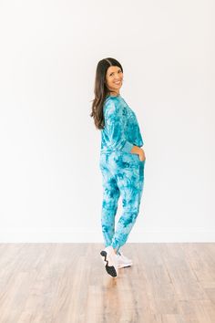 "Tie Dye Jogger Set/Tie Dye Lounge Set MATERIAL: A very soft and stretchy material. This is a lightweight material. 95% Cotton 5% Spandex (Black/White,Blue,Teal) 95% Polyester 5% Spandex (Pink) SIZING: Women's sizes Small, Medium, Large, X-Large **If you want a difference sized top/bottom within your set - I can certainly do that! Just make a note in the \"note to seller\" at checkout** Model is 5'4\", USA size 2, and wearing a size small. Overall Length: Small - 36.5 inches Medium - 37 inches L Blue Casual Tracksuit For Loungewear, Casual Blue Tracksuit For Loungewear, Casual Loungewear Sets With Long Pants, Matching Set Crew Neck Tops For Loungewear, Long Sleeve Sweats With Elastic Waistband For Lounging, Crew Neck Matching Lounge Set Tops, Crew Neck Matching Set Tops For Loungewear, Cozy Blue Sweats For Loungewear, Comfortable Long Sleeve Tracksuit For Lounging