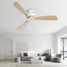 a modern living room with a ceiling fan