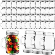 mason jars with lids and jelly beans in them