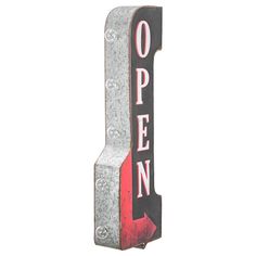 an open sign hanging from the side of a building with red letters on it's sides