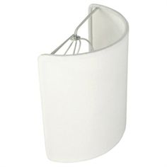 a white lamp shade with a metal hook