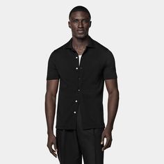 A perfect way to elevate any casual look, this black short-sleeve polo cardigan features a classic polo collar, a seven-button closure, and a slim, tapered silhouette for a sleek aesthetic. Fitted Collared Polo Shirt With Buttons, Fitted Black Button-up Short Sleeve Shirt, Fitted Black Short Sleeve Button-up Shirt, Fitted Button-up Polo Shirt For Business Casual, Fitted Polo Shirt With Button Closure For Business Casual, Fitted Button-up Polo Shirt, Fitted Short Sleeve Black Shirt With Buttons, Formal Summer Collared Polo Shirt, Formal Summer Polo Shirt