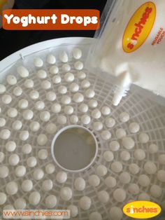 yogurt drops in a plastic container on a table