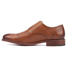 Introducing the Morgan monk strap, where fine brogue detailing adds textured sophistication. This slip-on style boasts an adjustable strap closure for a personalized fit and ease of wear. Perfect for adding a refined touch to both formal and casual outfits, the Morgan combines classic craftsmanship with modern convenience. Whether worn with tailored suits or smart-casual attire, its versatile design ensures you step out with confidence and style, making it an essential in any gentleman's wardrob Casual Oxford Shoes, Morgan Dress, Double Monk Strap, Rugged Leather, Brown Dress Shoes, The Morgan, Closed Toe Shoes, Cap Dress, Tailored Suits