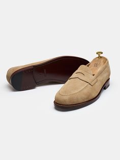 The Penny Loafer in unlined suede is pure indulgence. Its unlined construction makes the loafer incredibly soft, and the lack of an inner lining makes it remarkably breathable and comfortable - perfect for the warmer months of the year. Visually, it shares much likeness to its siblings; however, to the trained eye, the slightly slouchy silhouette makes it instantly recognizable as a true piece of craftsmanship.    Fits large in size  We recommend selecting half a size down from what you usually Mens Tassel Loafers, Months Of The Year, Loafer Sneakers, Shoe Tree, Tassel Loafers, Penny Loafer, Driving Shoes, Goodyear Welt, Suede Sneakers