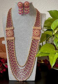 Checkout the trendy layered long necklace set for special occasions such as Anniversary, Engagement, Party, Wedding or for gifting. Color &  shades may slightly vary from the actual product due to natural lighting of the images. Product care: Avoid contact with Chemicals such as Perfumes or any Sprays. Prevent the Jewellery from the water. Use Butter Paper or Cotton Cloth to store your Jewellery for a longer Product life. Dholki Beads, Afghani Jewelry, Butter Paper, Long Necklace Set, Kuchi Jewelry, Ruby Beads, Layered Necklace Set, Natural Lighting, Layered Necklace