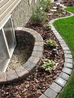 a small garden area in front of a house