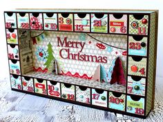 a christmas card display with lots of cards on it's front and back sides