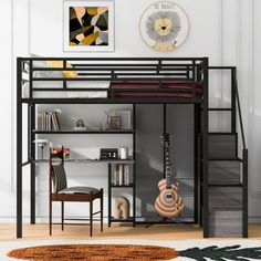 a loft bed with a desk underneath it and a guitar on the floor next to it