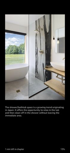 a bathroom with a large mirror next to a sink and bathtub in front of a window