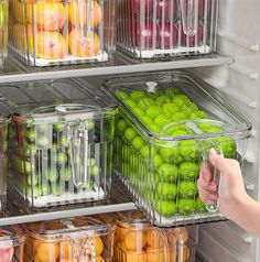 a refrigerator filled with lots of different types of fruits and vegetables next to each other