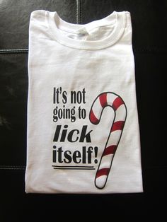 a t - shirt that says it's not going to lick itself on the front