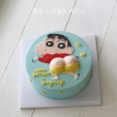 a birthday cake with a cartoon character on it