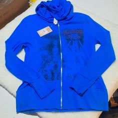 Description: Liberty Wear Midnight Rider Women's Hoodie Blue Xl New With Tags In Perfect Condition! Size (From Tag)Xl Measurement (Approximate) Neck: 23.5" Arm Pit To Arm Pit: 19.5" Shoulder To Shoulder: 15.5" Hip To Hip: 18" Back Of Color To Tail: 27" Arm Pit To Sleeve Cuff: 20.5" Please Contact Me If Any Other Measurements Are Needed! Open To Offers! Trendy Blue Hooded Jacket For Fall, Blue Hooded Outerwear With Relaxed Fit, Blue Relaxed Fit Hooded Outerwear, Midnight Rider, Women's Hoodie, Sleeve Cuff, Utility Jacket, Women's Coat, Hoodies Womens