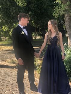 Matching Tux And Dress Prom, Black Tux With Navy Blue Vest, Navy Prom Tux, Tux With Black Dress Prom, Dark Blue Suit Prom, Black Suit Blue Tie Prom, All Black Tux Prom, Dark Blue Prom Couple