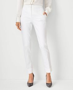 Elevate your wardrobe with the Ann Taylor Tall High Rise Eva Ankle Pant in Winter White. These pants redefine sophistication with their high-rise design and slim, cropped leg that creates a sleek, streamlined silhouette. Perfect for both office and casual wear, these pants blend style and comfort seamlessly.

- Size: 2
- Color: Winter White
- Material: 92% Cotton, 8% Spandex
- Fit: Regular fit, lean through the hip and thigh
- Rise: High rise, sits 1/2" to 1" below natural waist
- Length: Hits a White Pants Winter, Lean Legs, Slim Straight Pants, Knitted Suit, Spring Capsule Wardrobe, Tall Pants, Wardrobe Edit, Layer Dress, Spring Wardrobe