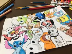 this is an image of a coloring book with cartoon characters on it and colored pencils next to it