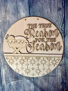 a wooden plaque that says the true reason for the season