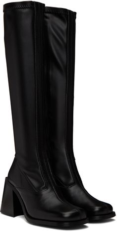 Handcrafted knee-high paneled buffed leather and stretch faux-leather boots in black. · Square toe · Zip closure at inner sides · Padded leather footbed · Stacked leather block heel with rubber injection · Buffed leather sole · Heel: H3.25 in Supplier color: Black Black Knee-high Platform Boots With Leather Sole, Leather Knee-high Boots With Pointed Toe, Leather Knee-high Platform Boots With Sculpted Heel, Modern Black Leather Knee-high Boots, Wide Calf Leather Mid-calf Heeled Boots, Wide Calf Leather Heeled Mid-calf Boots, Fitted Leather Mid-calf Boots, Black Leather Knee-high Platform Boots, Black Knee-high Calf Leather Heeled Boots