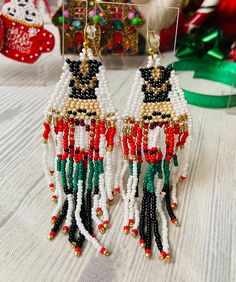 It's the most wonderful time of the year! Time for Holiday Earrings! Wow your relatives with these festive, beaded dangle/drop earrings! So pretty and so unique!  Makes a great gift for the special person in you life!  Make a great gift for the hostess in the house too! Colorful Beads Christmas Earrings Gift, Christmas Festive Beaded Dangling Earrings, Christmas Gift Earrings With Colorful Beads, Colorful Beads Earrings For Christmas Gift, Handmade Christmas Earrings For Celebration, Handmade Christmas Celebration Earrings, Novelty Beaded Earrings For Gift, White Beaded Earrings For Christmas, Teen Earrings