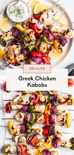 grilled greek chicken kabobs on skewers with lemons and red onions